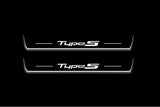 Two long door sill plates with Type S lettering and edges illuminated in white, straight-on view on a dark background.
