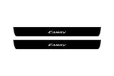 Toyota Camry V50 XV50 2012+ illuminated door sill protectors in matte black coated stainless steel with Camry logo