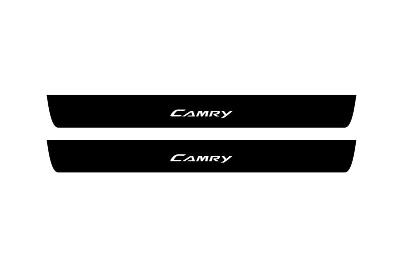 Toyota Camry V50 XV50 2012+ illuminated door sill protectors in matte black coated stainless steel with Camry logo