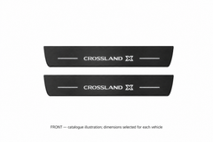 Vauxhall Crossland X Matte PRO catalogue illustration: two flat black FRONT plates with illuminated Crossland X lettering on white; not exact dimensions