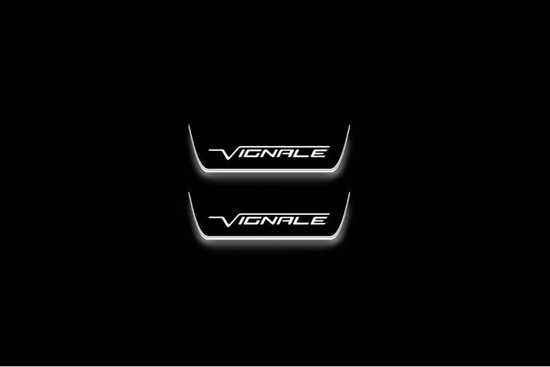 Ford Edge II 2015+ illuminated entry guards in stainless steel with Vignale logo