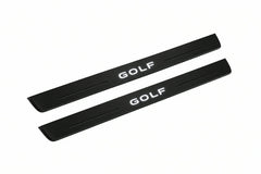 Catalogue illustration of two front black Matte PRO LED door sill plates with illuminated Golf lettering for Volkswagen Golf Mk8 CD1; dimensions are selected during manufacture.
