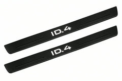 Catalogue illustration of two front black Matte PRO LED door sill plates with illuminated ID.4 lettering for Volkswagen ID.4 E21; dimensions are selected during manufacture.