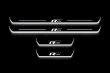 Volkswagen Tiguan 5N R-Line stainless steel LED door sills — complete Front + Rear set, two long front and two short rear plates, white illumination on black