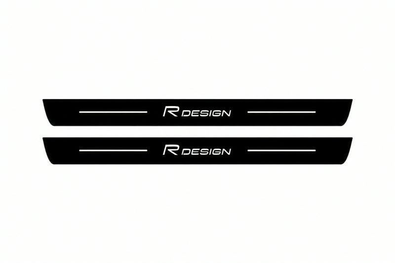Catalogue illustration of two front black Matte PRO LED door sill plates with illuminated Rdesign lettering for Volvo XC90 II; dimensions are selected during manufacture.