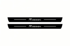 Catalogue illustration of two front black Matte PRO LED door sill plates with illuminated Rdesign lettering for Volvo XC90 II; dimensions are selected during manufacture.