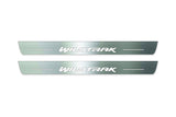 Two long silver-finished door sill plates with Wildtrak lettering on a light background, straight-on view.