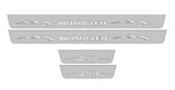 Catalog illustration of four gray door sill plates: white Wrangler lettering with mountain graphics on the long pair and Jeep lettering on the short pair.