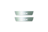 Two short silver-finished door sill plates with WRX lettering on a light background, straight-on view.