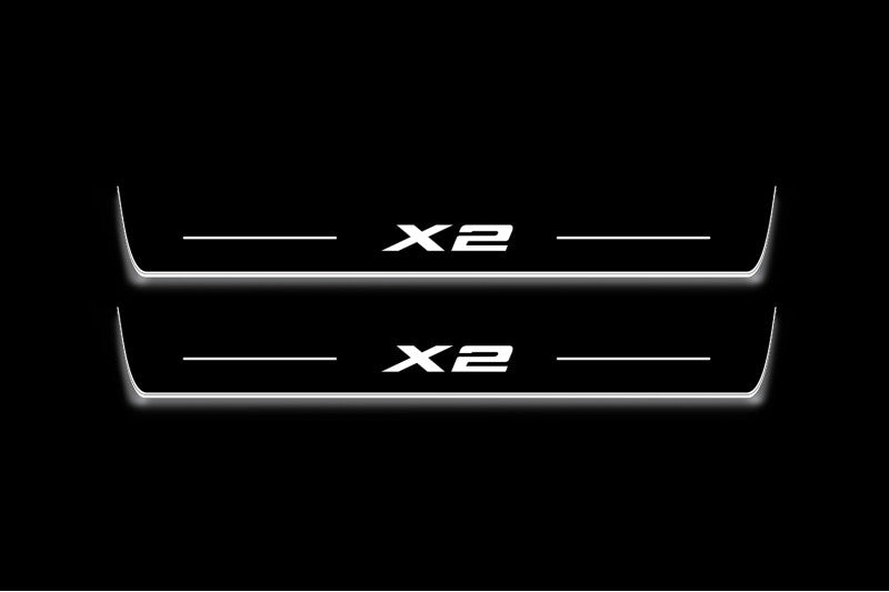BMW X2 F39 2018+ stainless steel illuminated entry guards with X2 logo