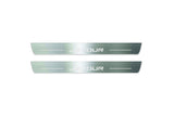 Two long silver-finished door sill plates with Jetour lettering on a light background, straight-on view.