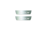 Two short silver-finished door sill plates with Jetour lettering on a light background, straight-on view.