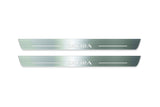 Two long silver-finished door sill plates with Zafira lettering on a light background, straight-on view.