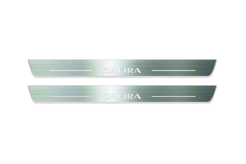 Two long silver-finished door sill plates with Zafira lettering on a light background, straight-on view.