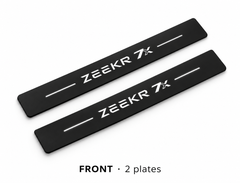 Matte PRO catalogue illustration: two flat black FRONT plates with illuminated ZEEKR 7X lettering and top lines on white; not exact vehicle dimensions