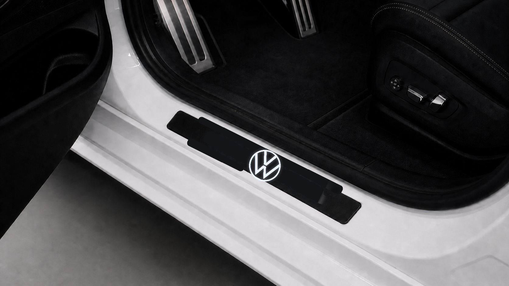 Matched installed Volkswagen LED door sill scene with Volkswagen illuminated inscription
