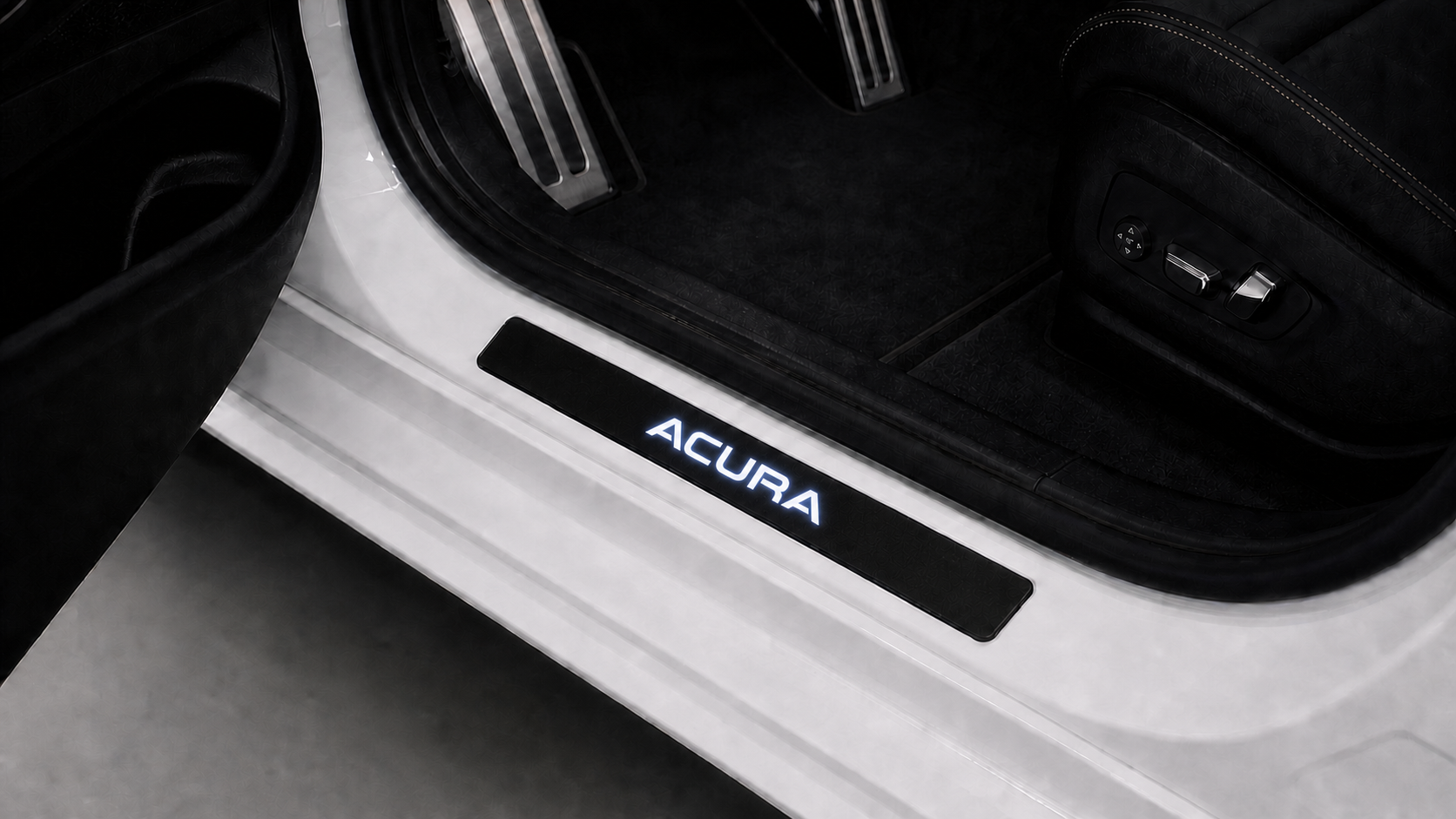 Matched installed Acura LED door sill scene with ACURA illuminated inscription
